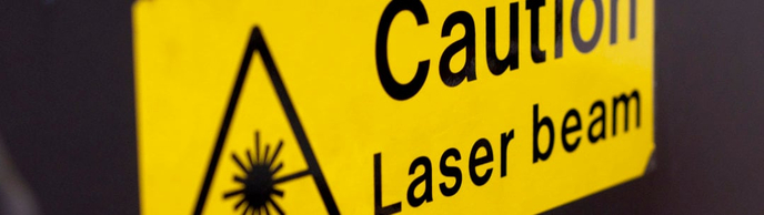 Laser Beam Caution Yellow Sign